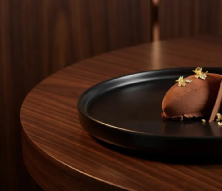 Selection of signature desserts at The Velvet Token including chocolate mousse and crème brûlée.